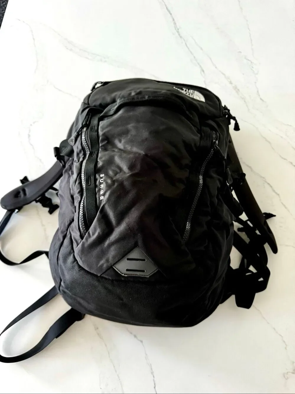 The North Face SURGE Backpack. Black.